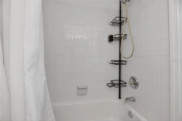 an aerial view of a house with a garden trees