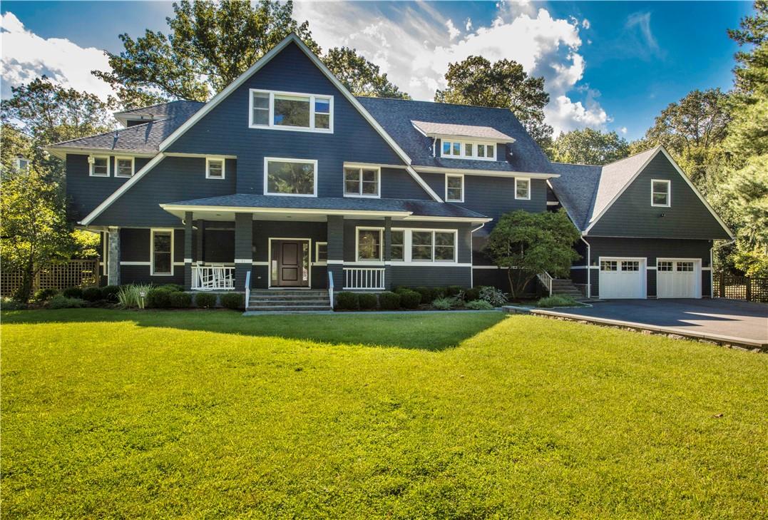 91 Beechdale Road Dobbs Ferry, NY 10522 - Photo 1 of 1 a front view of a house with swimming pool