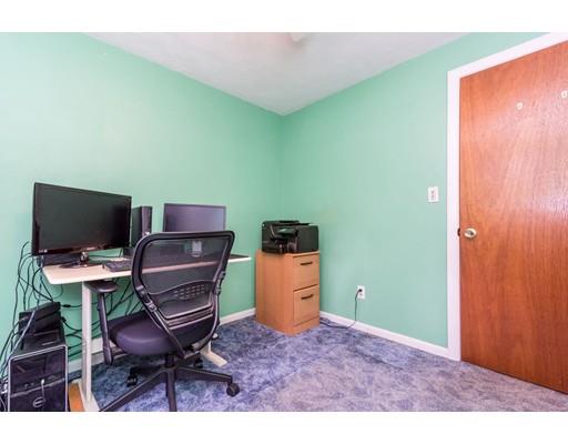 124 Lowell Road Pepperell, MA 01463 - Photo 15 of 27 a workspace with furniture