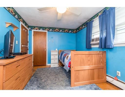 124 Lowell Road Pepperell, MA 01463 - Photo 17 of 27 a bedroom with a bed and a dresser
