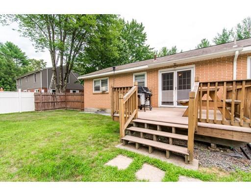 124 Lowell Road Pepperell, MA 01463 - Photo 24 of 27 a house view with a backyard space