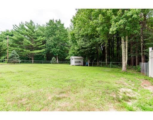 124 Lowell Road Pepperell, MA 01463 - Photo 25 of 27 a house view with a garden space