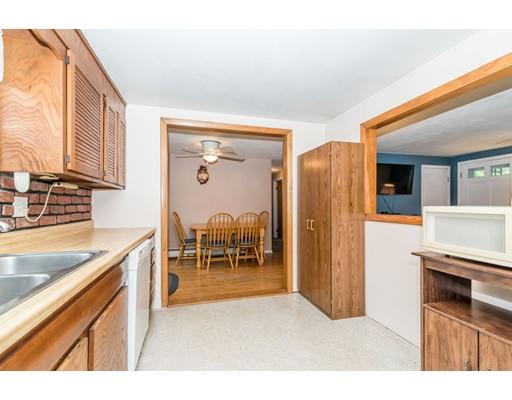 124 Lowell Road Pepperell, MA 01463 - Photo 5 of 27 a kitchen with stainless steel appliances granite countertop a refrigerator and a sink