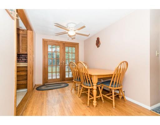 124 Lowell Road Pepperell, MA 01463 - Photo 6 of 27 a view of a dining room with furniture window and wooden floor