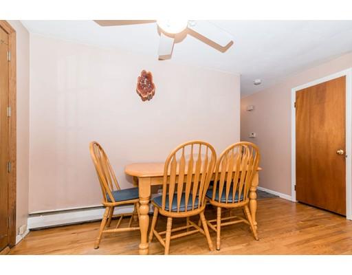 124 Lowell Road Pepperell, MA 01463 - Photo 7 of 27 a view of a dining room with furniture and wooden floor