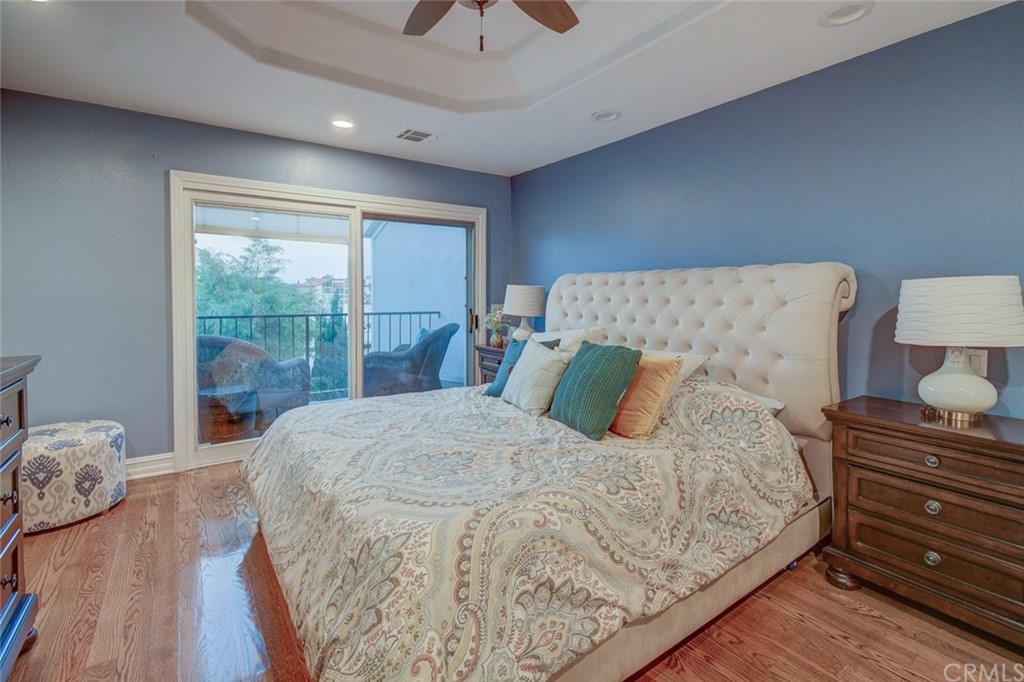 3901 Aruba Circle Huntington Beach, CA 92649 - Photo 15 of 56 a bed sitting in a bedroom next to a window