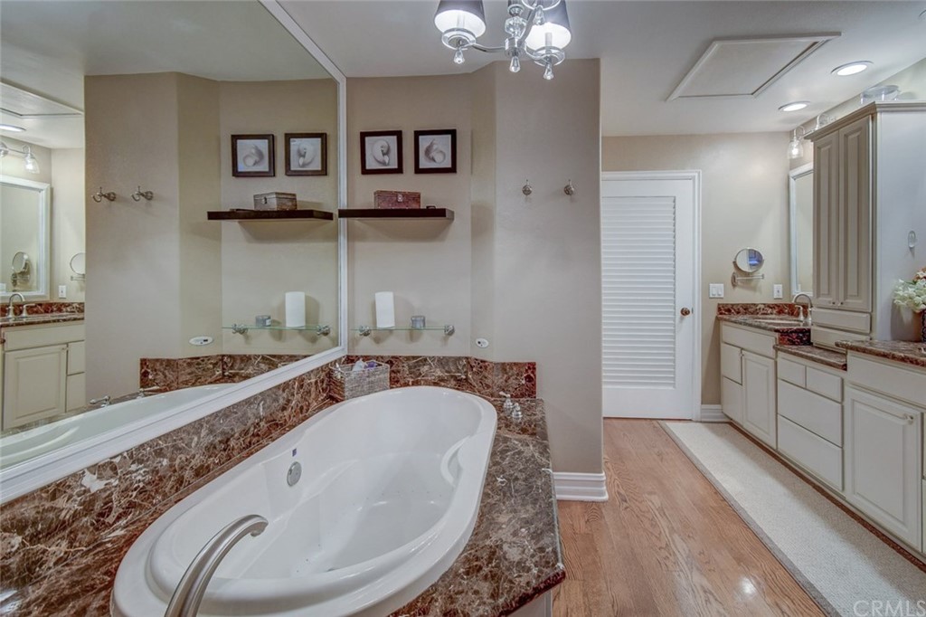 3901 Aruba Circle Huntington Beach, CA 92649 - Photo 17 of 56 Master Bath with Skylight, walk in shower and jetted tub.