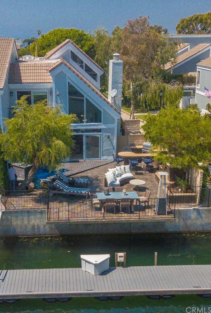 3901 Aruba Circle Huntington Beach, CA 92649 - Photo 2 of 56 a view of a house with a yard and sitting area