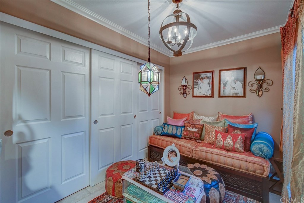 3901 Aruba Circle Huntington Beach, CA 92649 - Photo 21 of 56 Downstairs Guest Room with Seating area, bath and private pation
