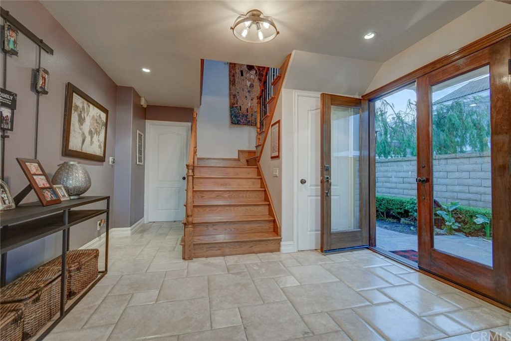 3901 Aruba Circle Huntington Beach, CA 92649 - Photo 23 of 56 a view of entryway and hall with wooden floor