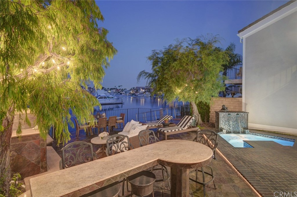 3901 Aruba Circle Huntington Beach, CA 92649 - Photo 48 of 56 a view of a house with backyard and sitting area