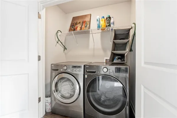 a utility room with dryer and washer