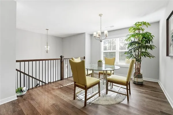 a view of a livingroom with furniture and window