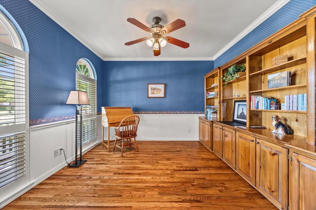 425 Chippendale Drive Heath, TX 75032 - Photo 14 of 37 a workspace with furniture ceiling fan and window