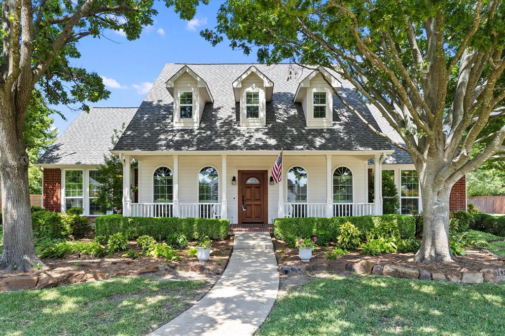 425 Chippendale Drive Heath, TX 75032 - Photo 2 of 37 front view of a house with a yard