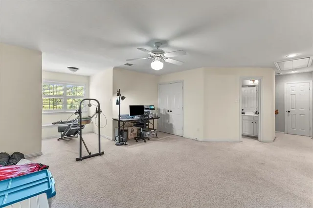 a view of a livingroom with furniture and a flat screen tv