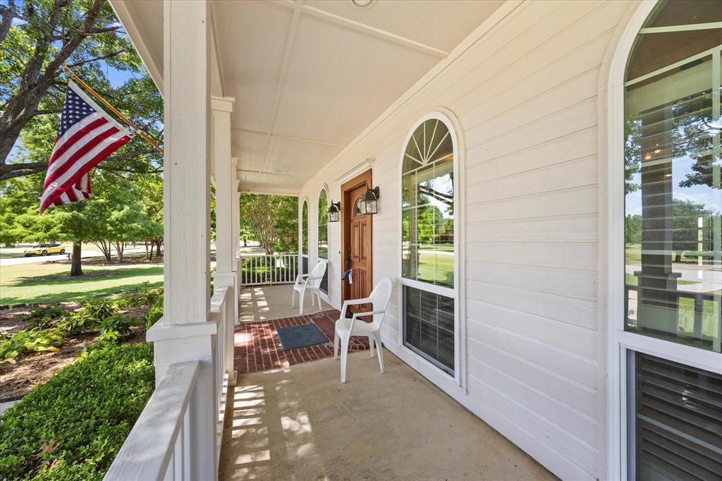 425 Chippendale Drive Heath, TX 75032 - Photo 26 of 37 a view of a two chairs in the balcony