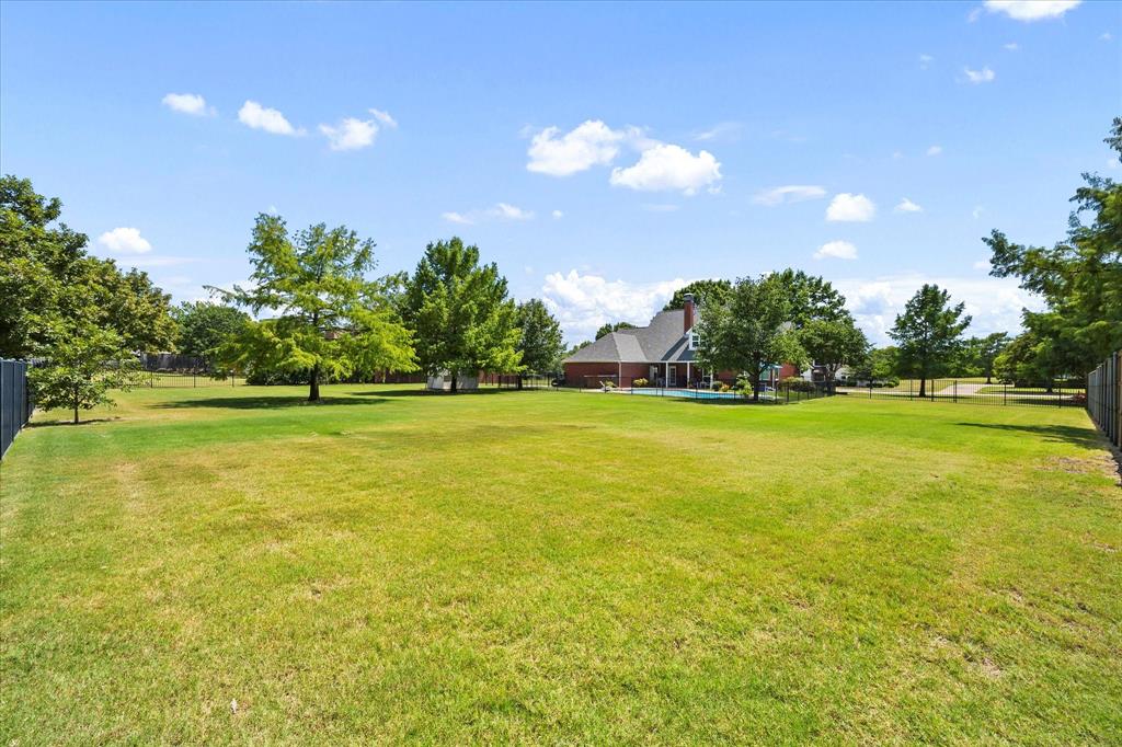 425 Chippendale Drive Heath, TX 75032 - Photo 36 of 37 a view of a green field