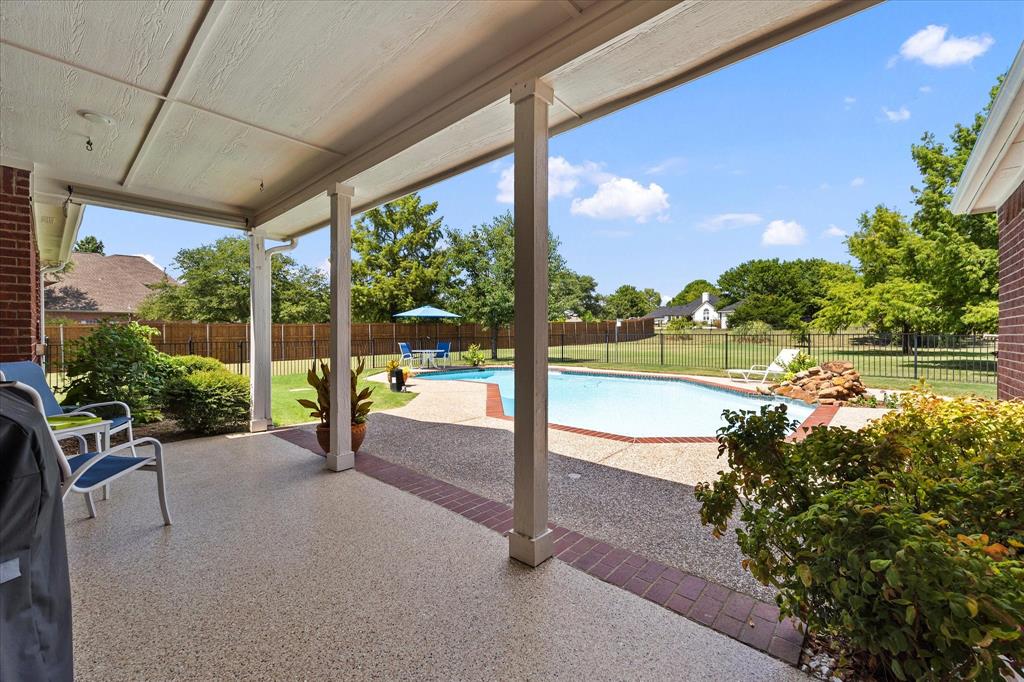 425 Chippendale Drive Heath, TX 75032 - Photo 4 of 37 a view of swimming pool with outdoor seating