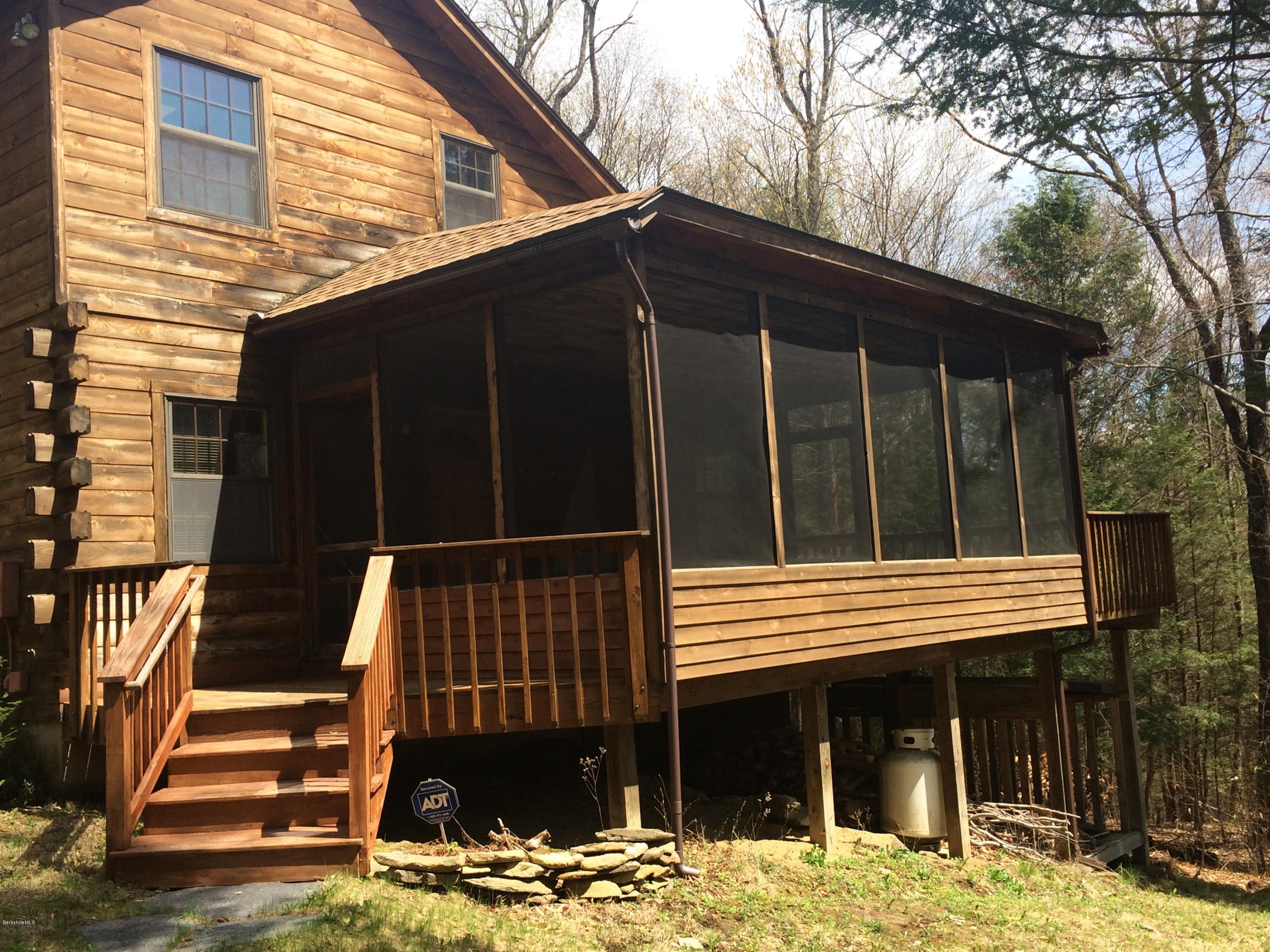 857 Surriner Road Becket, MA 01223 - Photo 4 of 27 a view of house with outdoor space