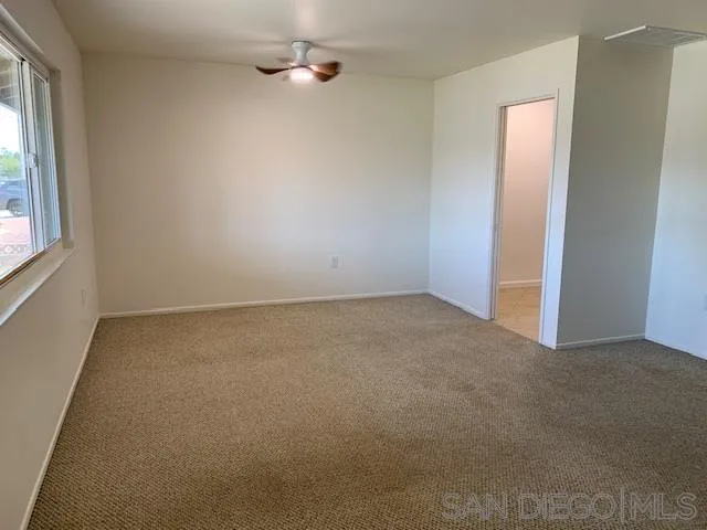 28757 West Worcester Road Menifee, CA 92586 - Photo 8 of 21 an empty room with a window