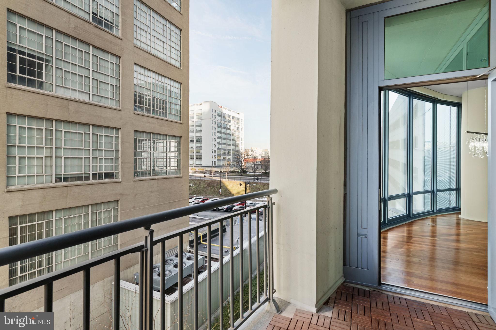 2101 Market Street, Unit 302 Philadelphia, PA 19103 - Photo 28 of 53 a view of balcony with wooden floor