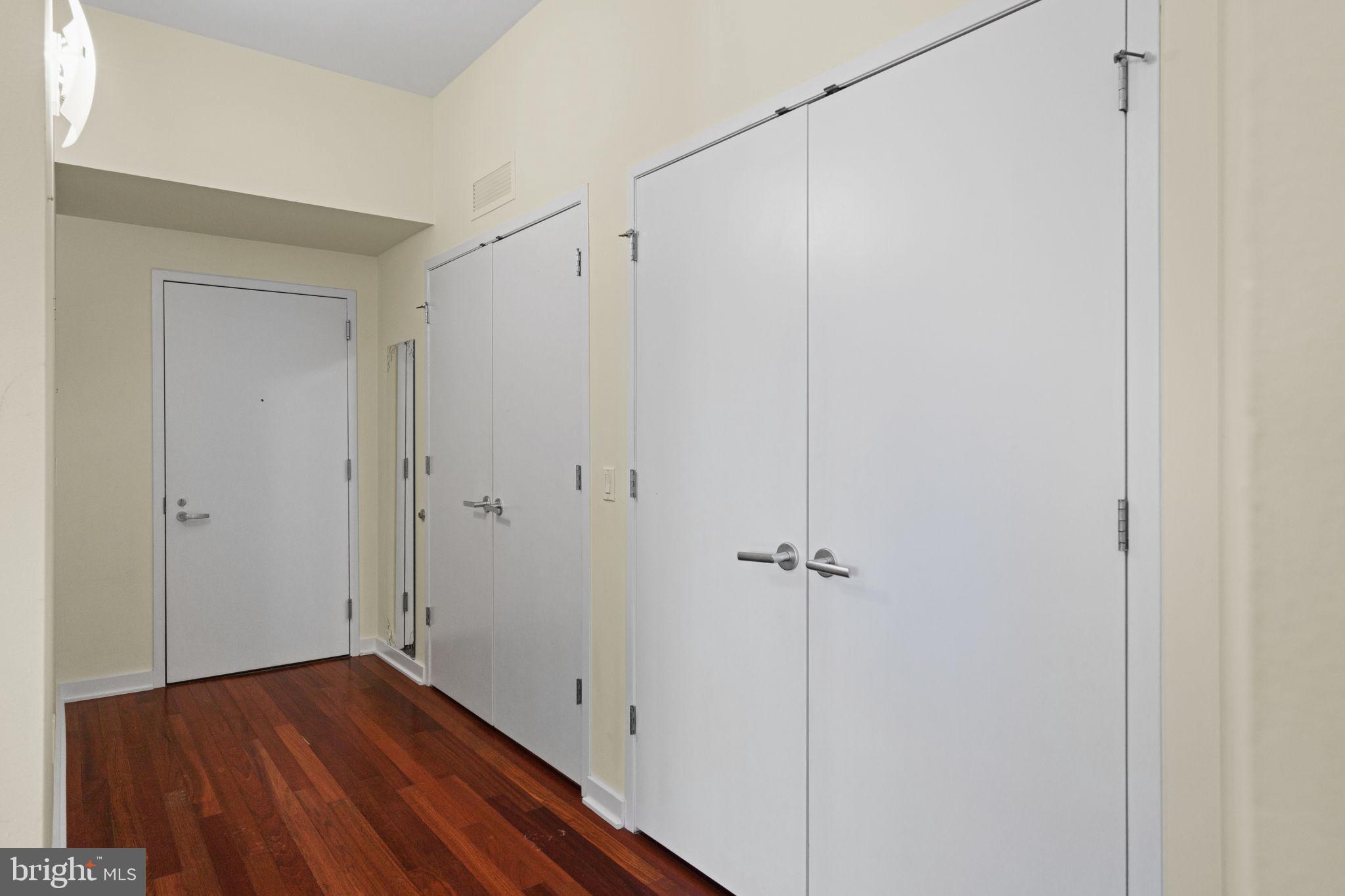 2101 Market Street, Unit 302 Philadelphia, PA 19103 - Photo 5 of 53 a view of room with hardwood floor