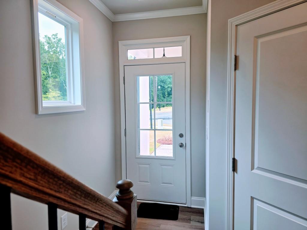 4240 Cavalier Way Duluth, GA 30097 - Photo 2 of 46 wooden floor in an empty room with a window