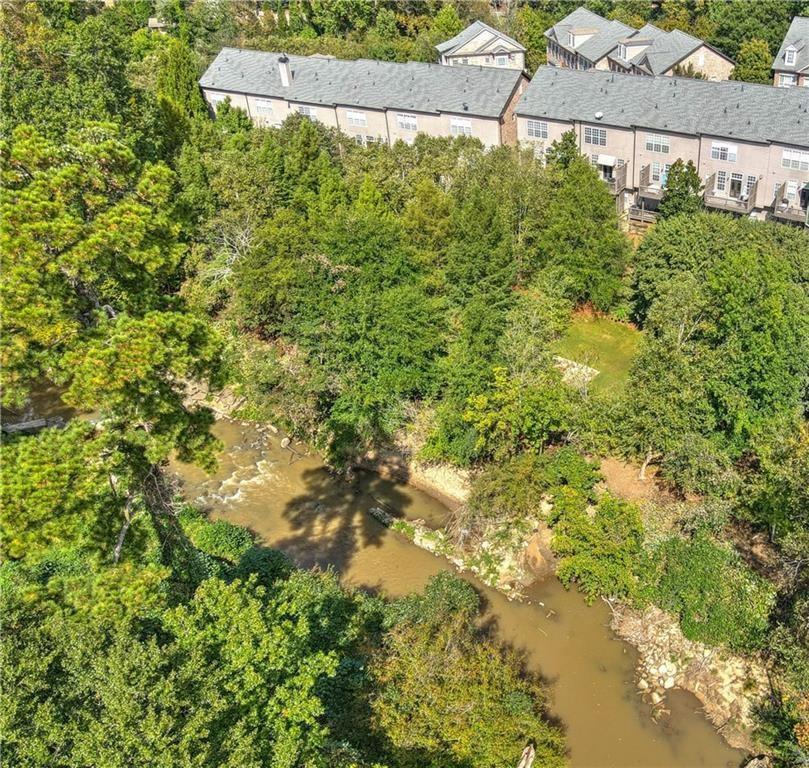 1615 Rivers Edge Trail Northeast Atlanta, GA 30324 - Photo 24 of 26 a view of a garden with a tree