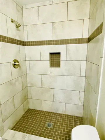 a bathroom with a sink and a shower