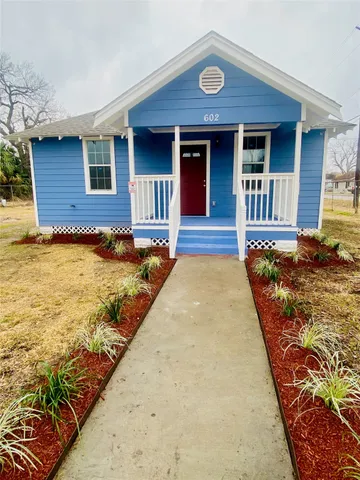 a front view of a house with swimming pool