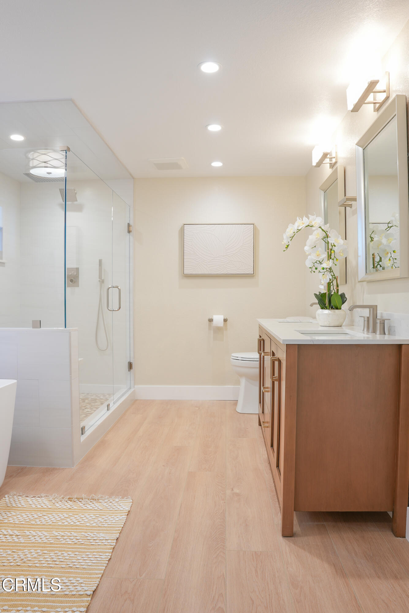 2517 Panama Drive Oxnard, CA 93035 - Photo 6 of 27 a bathroom with a sink and a mirror