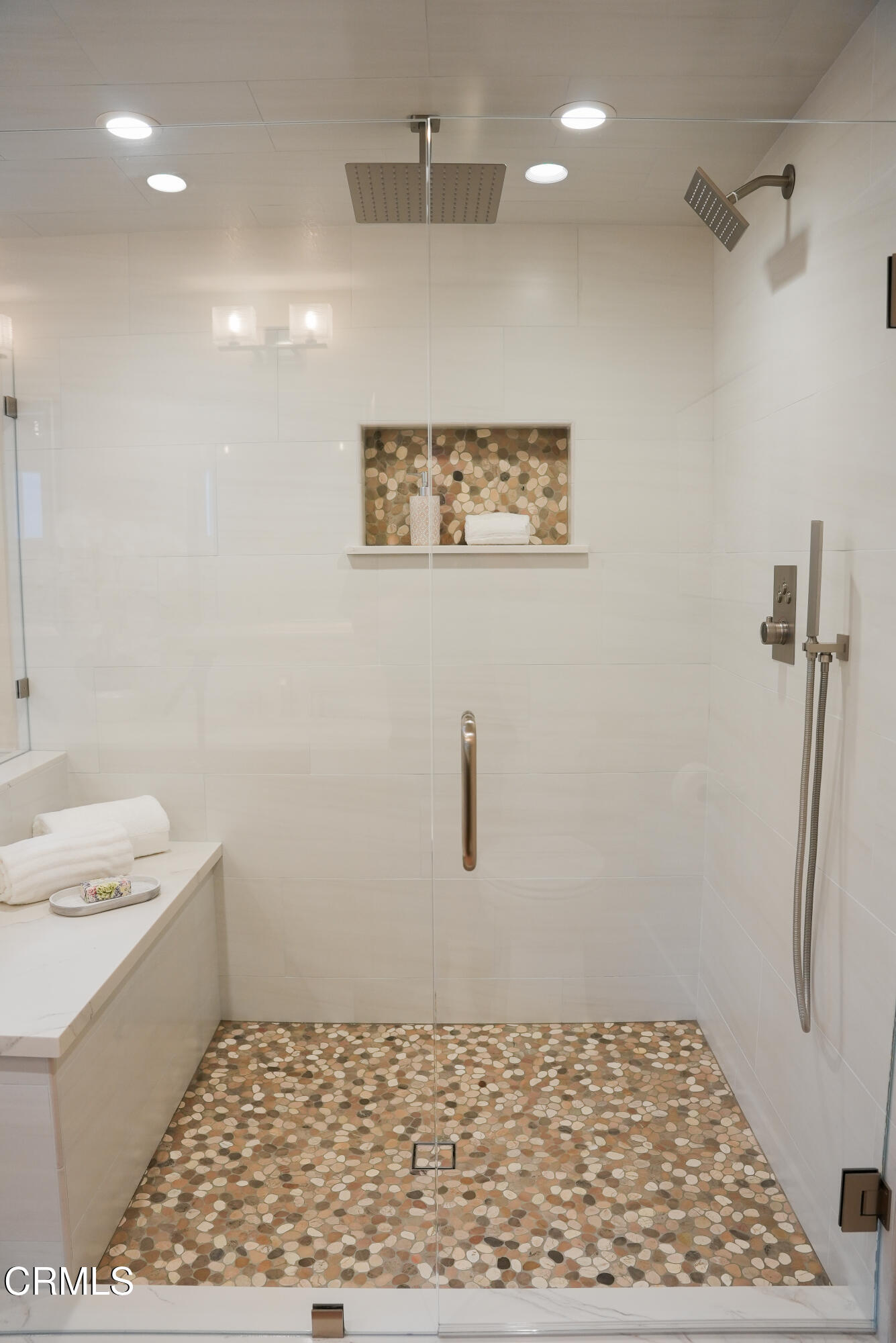 2517 Panama Drive Oxnard, CA 93035 - Photo 9 of 27 a bathroom with a sink a vanity and a shower