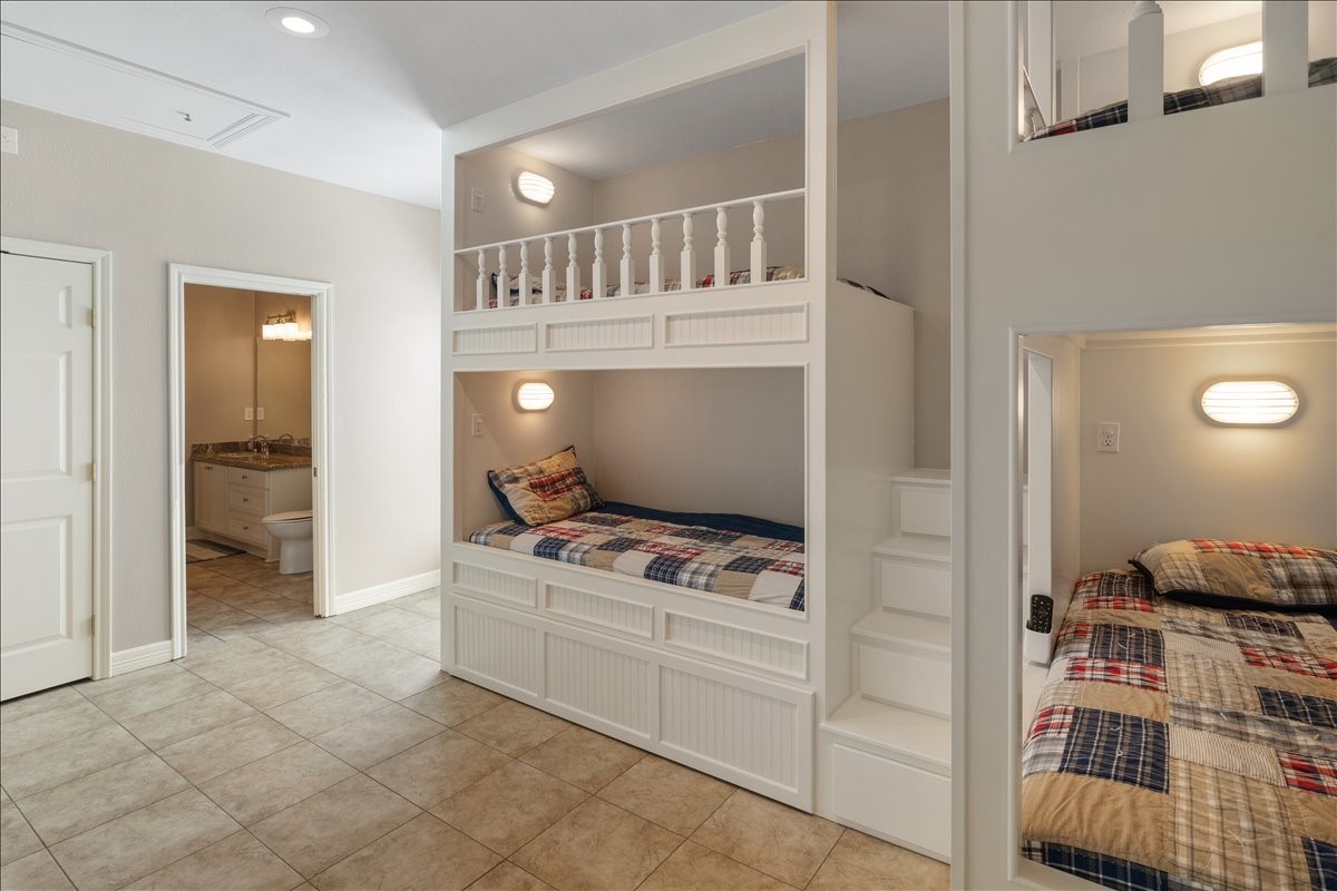 3093 Greg Street Crystal Beach, TX 77650 - Photo 41 of 48 a kitchen with stainless steel appliances granite countertop a stove and a refrigerator