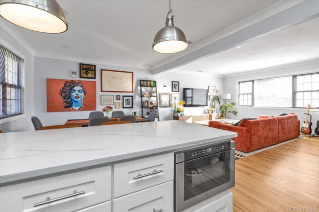 a kitchen with a sink a stove and refrigerator