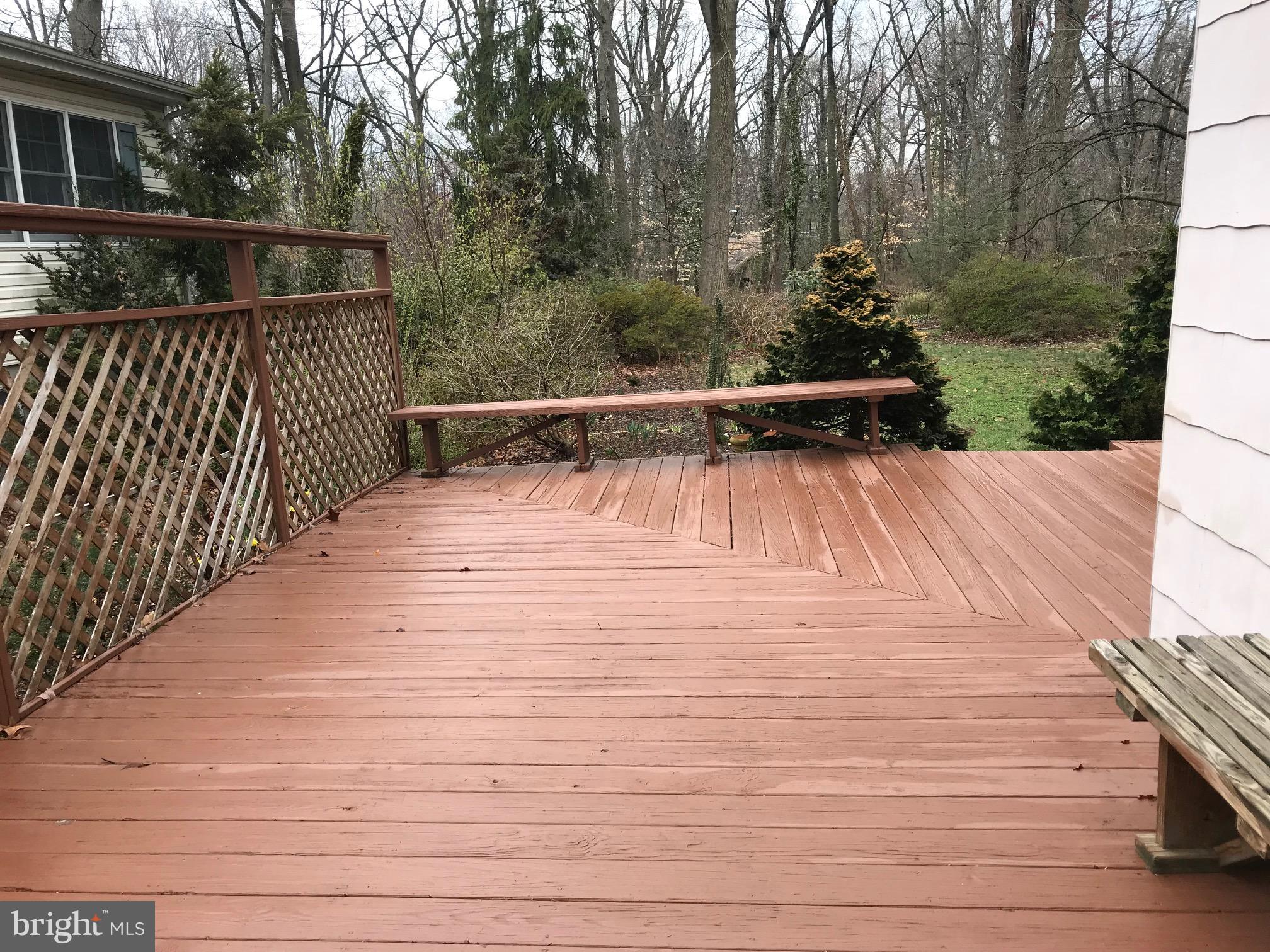 918 Litchfield Road Baltimore, MD 21239 - Photo 21 of 24 View of large deck overlooking backyard
