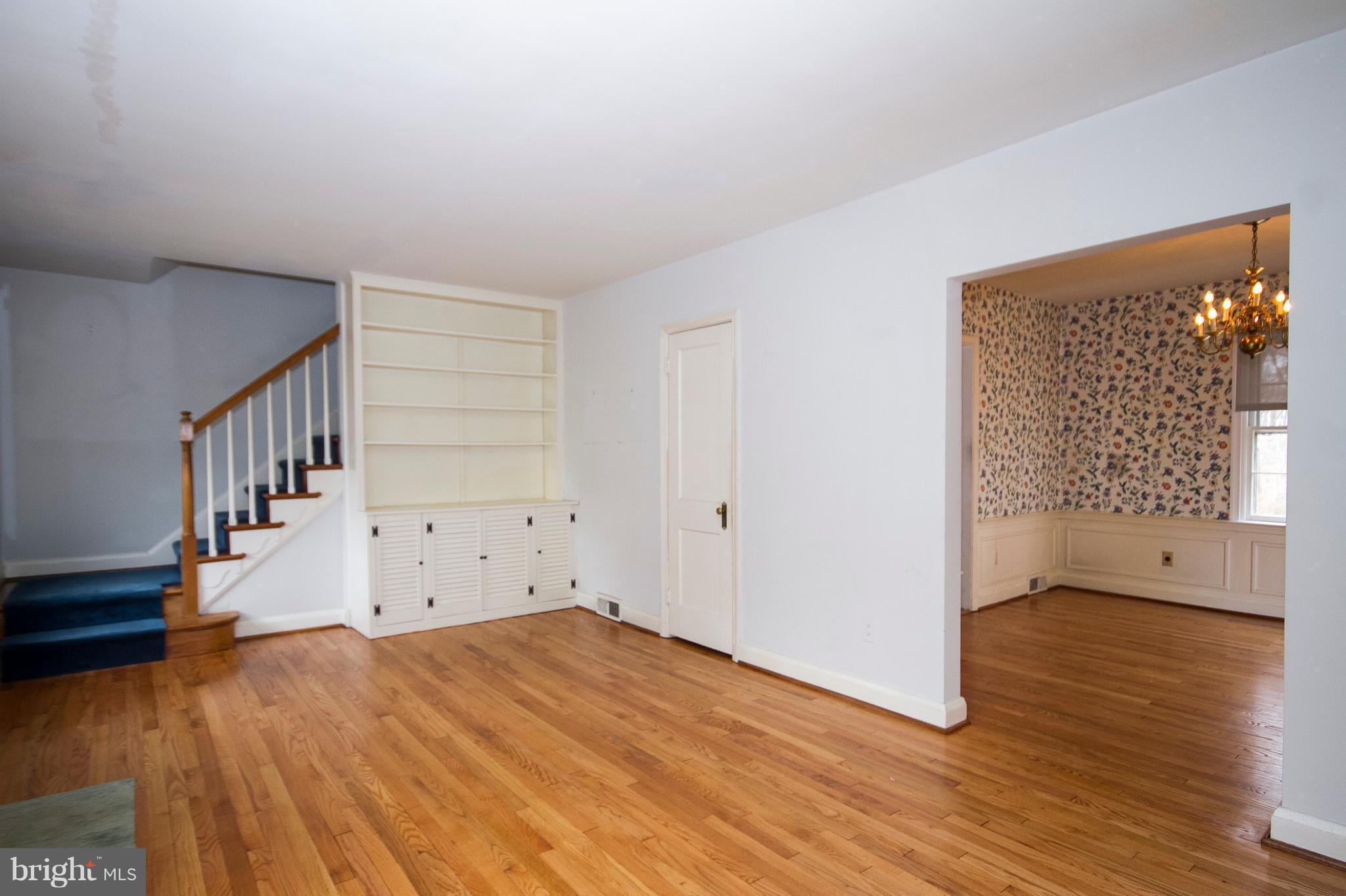 918 Litchfield Road Baltimore, MD 21239 - Photo 6 of 24 Living Room has built in shelving and cabinetry