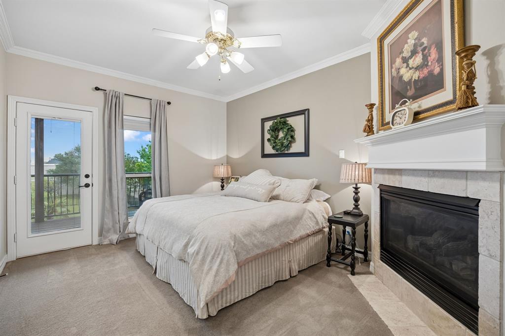 2930 Falcon Way Midlothian, TX 76065 - Photo 20 of 40 a bedroom with a bed and a fireplace