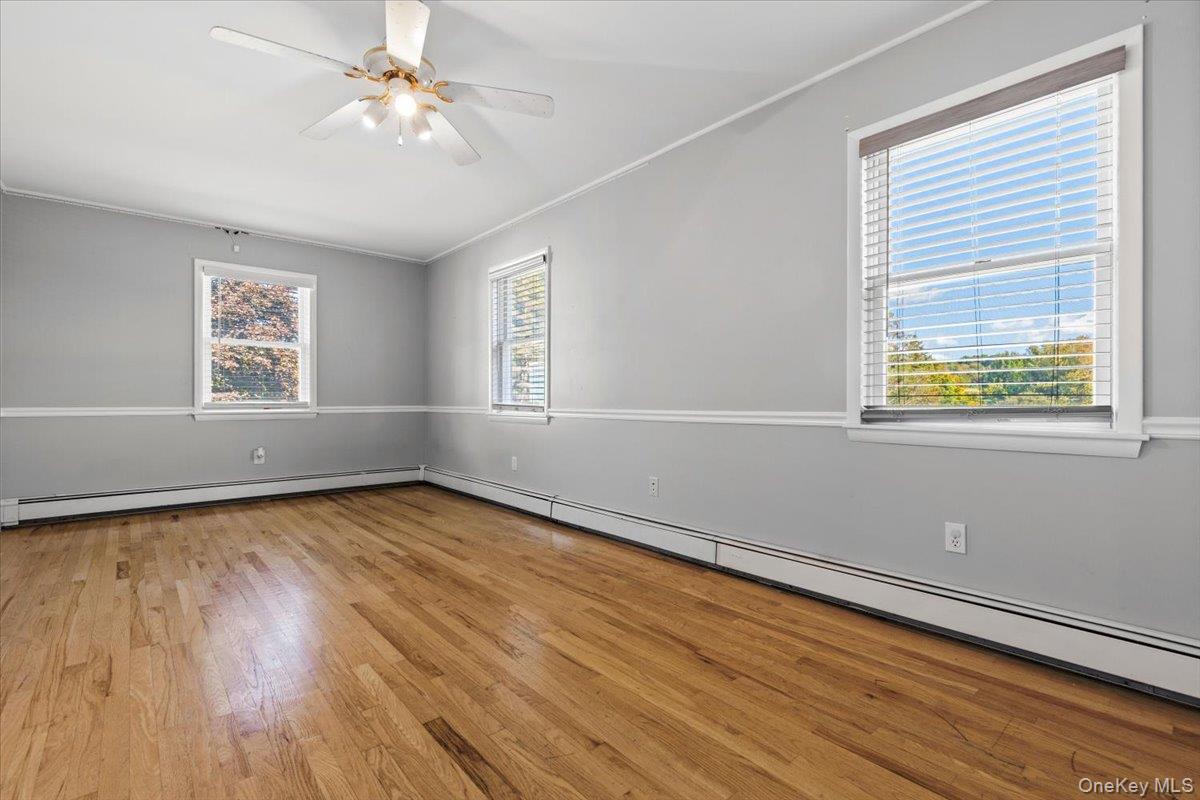 56 Daley Road Poughkeepsie, NY 12603 - Photo 16 of 35 a view of an empty room with wooden floor and a window