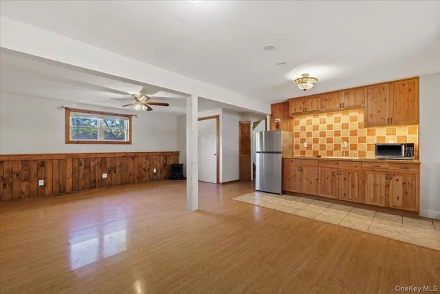 a house with swimming pool in front of it