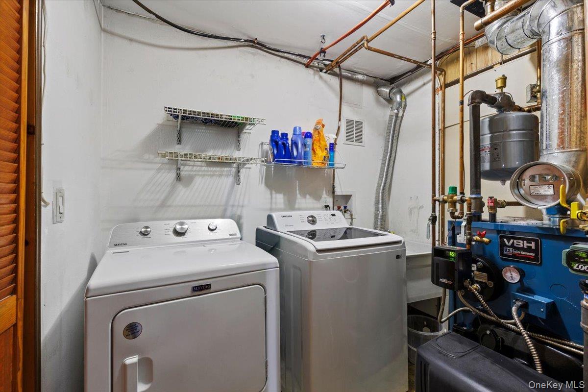 56 Daley Road Poughkeepsie, NY 12603 - Photo 28 of 35 a utility room with dryer and washer