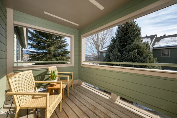 a view of a two chair in the balcony