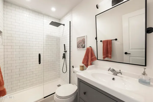 a view of a hallway with front door