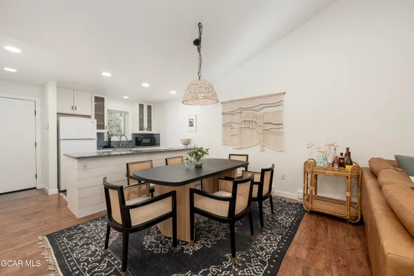 a view of a dining room with furniture