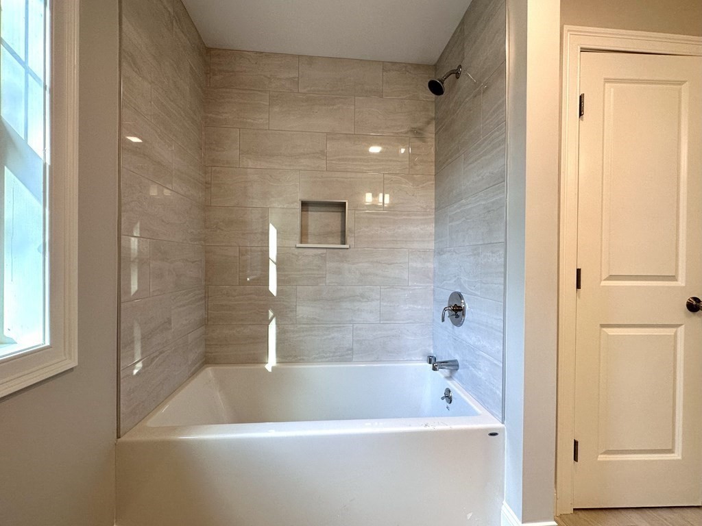 225 High Street Canton, MA 02021 - Photo 12 of 22 a bathroom with a bathtub