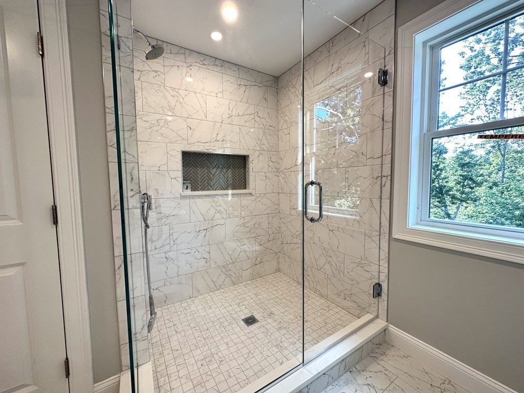 225 High Street Canton, MA 02021 - Photo 19 of 22 a bathroom with a shower and a mirror