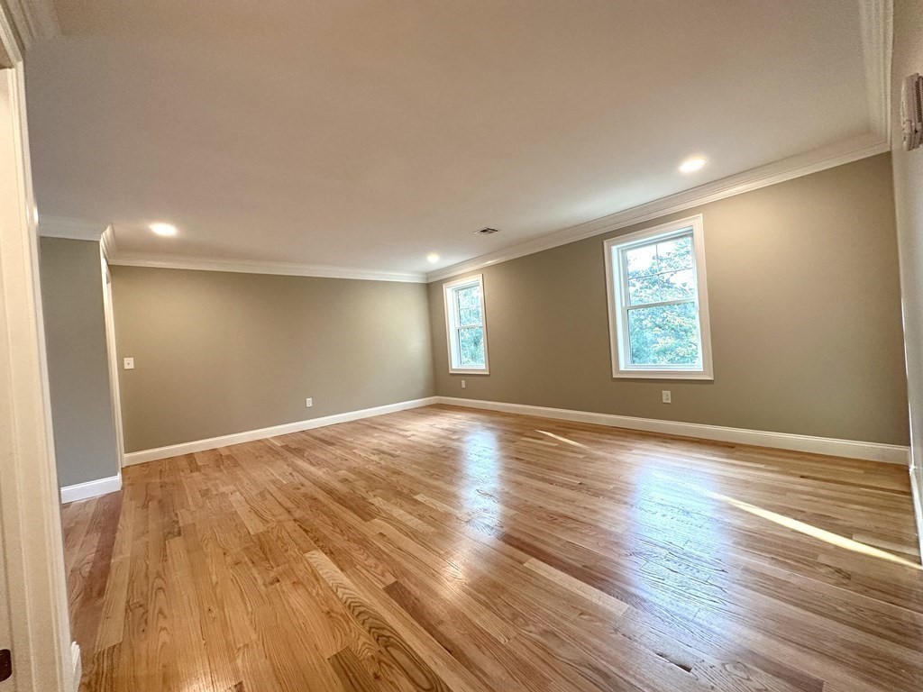 225 High Street Canton, MA 02021 - Photo 20 of 22 a view of empty room with wooden floor and fan