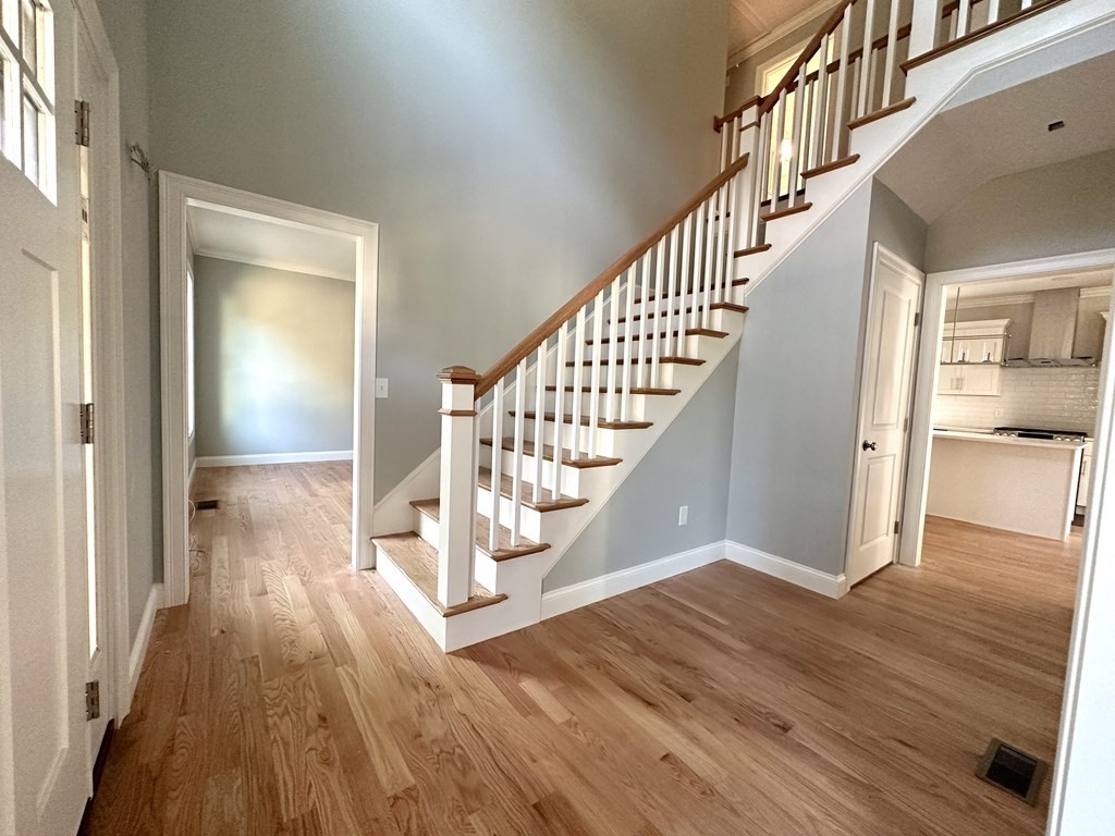 225 High Street Canton, MA 02021 - Photo 2 of 22 a view of entryway and hall with wooden floor