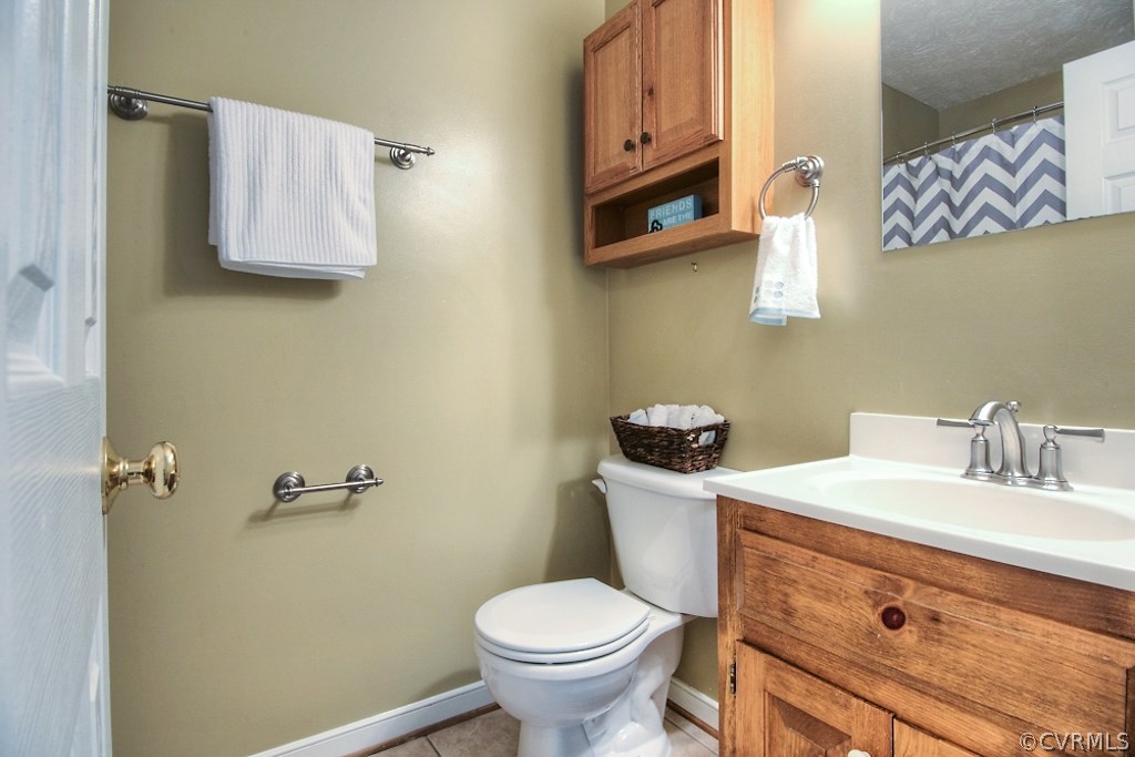 19493 Courtney Road Hanover, VA 23069 - Photo 24 of 30 Hall bath with updated vanity, light fixture and t