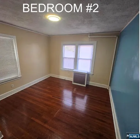 a view of livingroom with hardwood floor and window